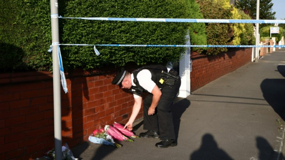 People have paid tribute at the site of Monday's knife attack in Southport, near Liverpool