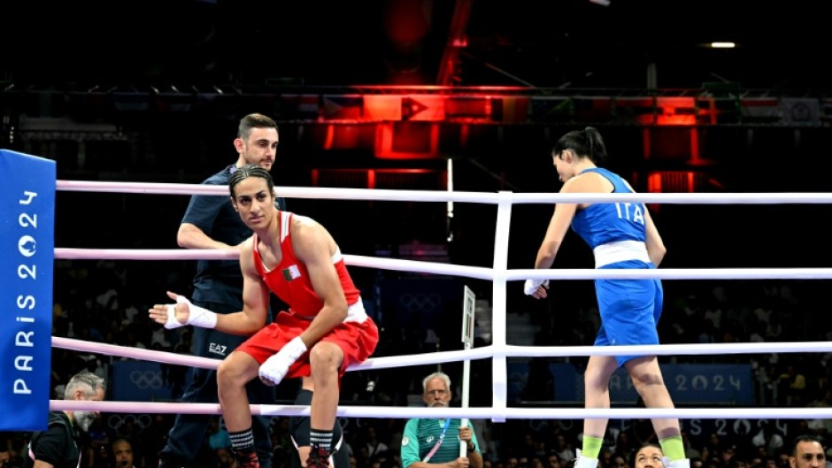 Algeria's Imane Khelif (in red) was given a huge roar on arrival at the Paris arena