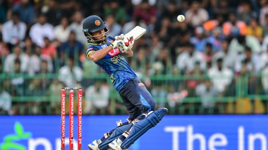 Sri Lanka's Dunith Wellalage plays a shot during the first one-day international (ODI) cricket match between Sri Lanka and India in Colombo on August 2