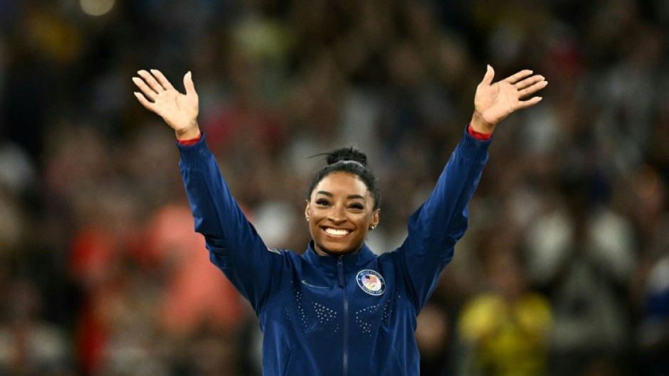 Simone Biles can win two more gold on the balance beam and floor exercise on Monday for five titles at the Paris Olympics