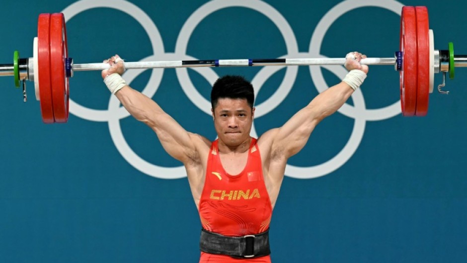 Show of strength - China's Li Fabin powers to weightlifting gold