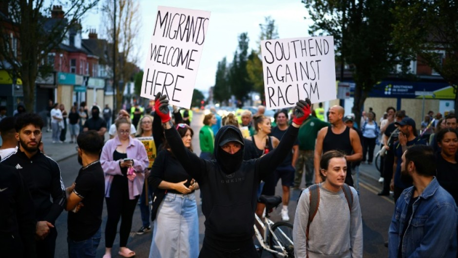 People protest at anti-immigrant violence instigated by the far right