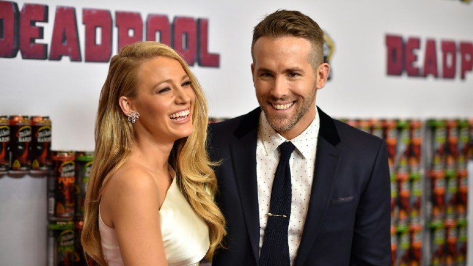 Actors Blake Lively and her husband Ryan Reynolds, seen at a 'Deadpool & Wolverine' event in New York on August 10, 2024, had a true power-couple weekend; his film topped the North American box office and hers, 'It Ends With Us,' came a close second