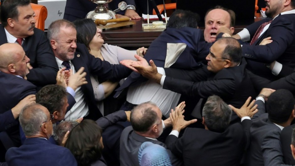 Footage posted online showed the brawl and then staff cleaning blood stains from the parliament floor afterwards