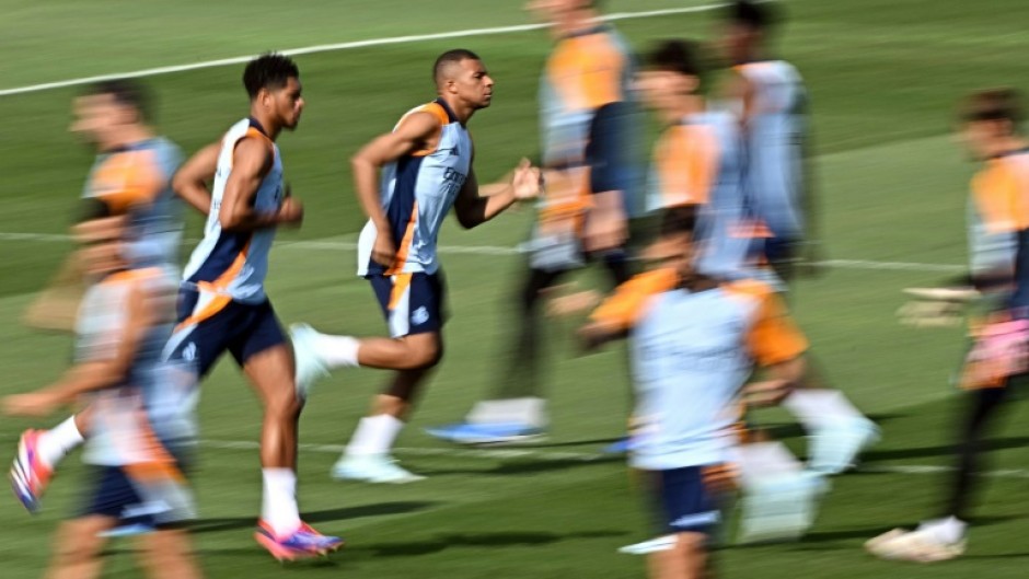 Real Madrid's French forward Kylian Mbappe (C) trained Saturday ahead of his likely La Liga debut against Mallorca 