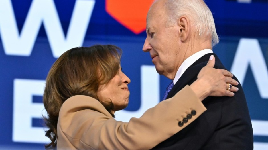 US President Joe Biden hugged US Vice President and 2024 Democratic presidential candidate Kamala Harris after his speech