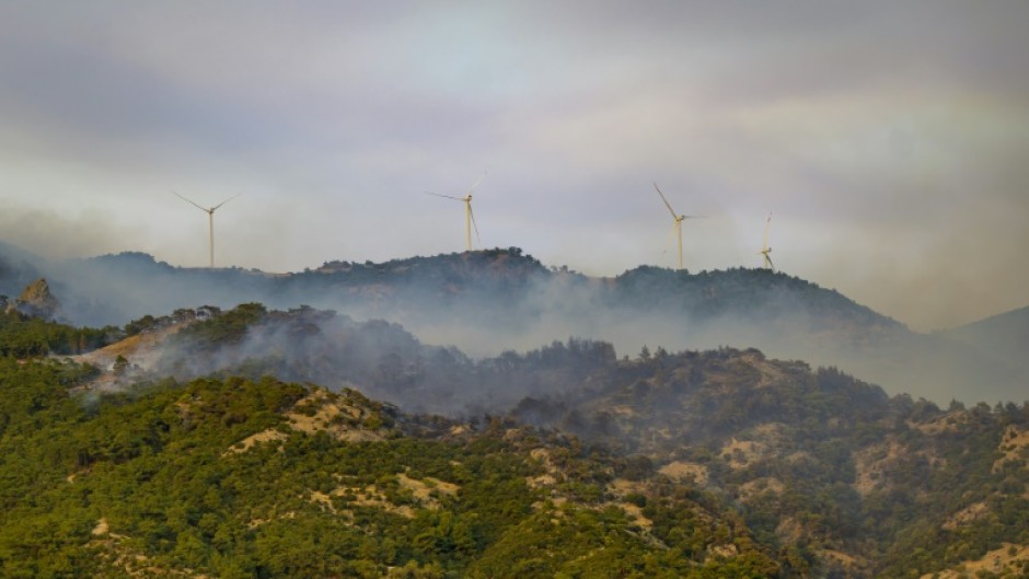 Officials say seven people were detained Izmir over alleged links to the fire