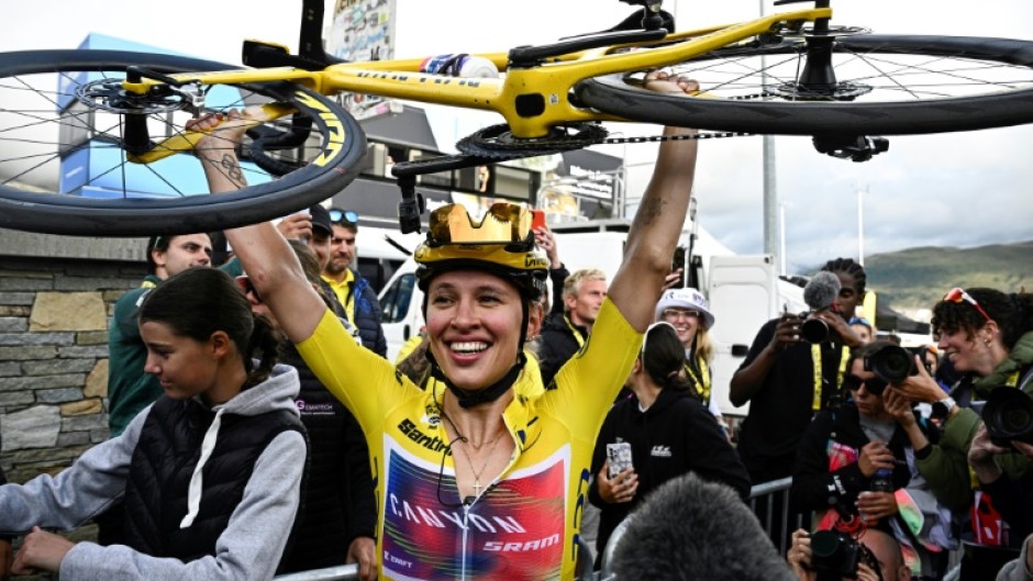 Katarzyna Niewiadoma celebrates after winning her maiden women's Tour de France crown