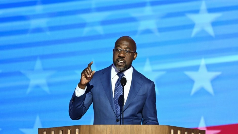 Raphael Warnock, a Democratic senator and pastor from the southern US state of Georgia, speaks on the first day of the Democratic National Convention in Chicago