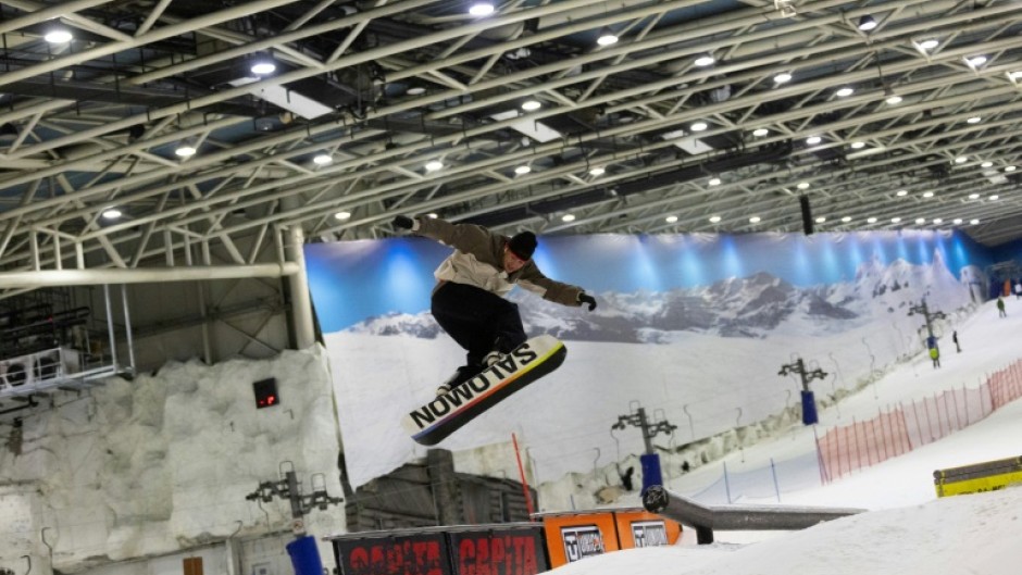 A snowboarder enjoys a run at Xanadu Snozone, the only indoor ski slope in Spain, located in Arroyomolinos near Madrid