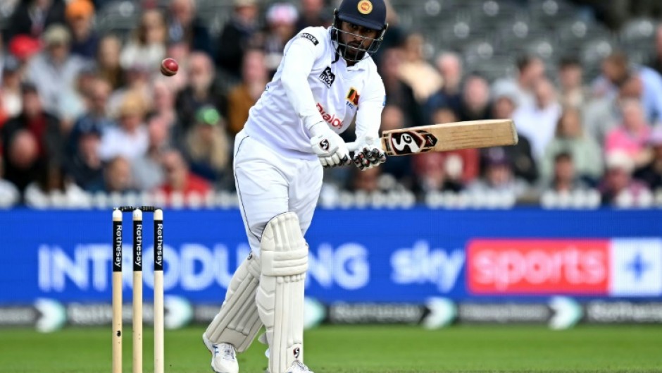 Stylish defiance: Sri Lanka's Kamindu Mendis clips the ball off his pads  at Old Trafford