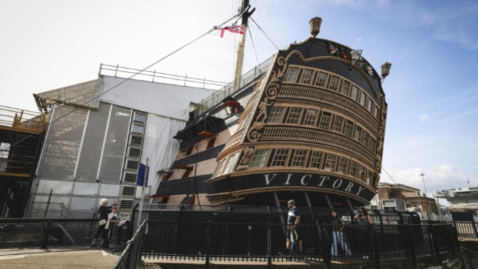 Resoration work has left the central part of HMS victory encased in scaffolding