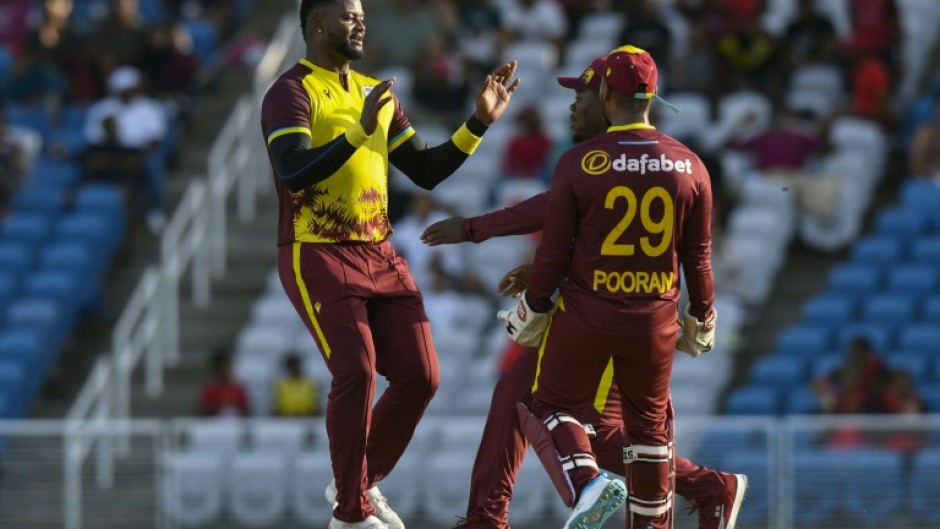 Romario Shepherd of West Indies celebrates the dismissal of Reeza Hendricks of South Africa during the 2nd T20I match at Brian Lara Cricket Academy on Sunday