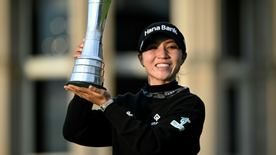 Victory joy: New Zealand's Lydia Ko poses with the trophy after winning the Women's British Open Golf Championship, on the Old Course at St Andrews