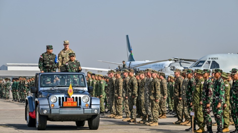 Senior Indonesian and US military officials inspect troops from their countries and eight others taking part in Super Garuda Shield joint military exercises in Sidoarjo, East Java