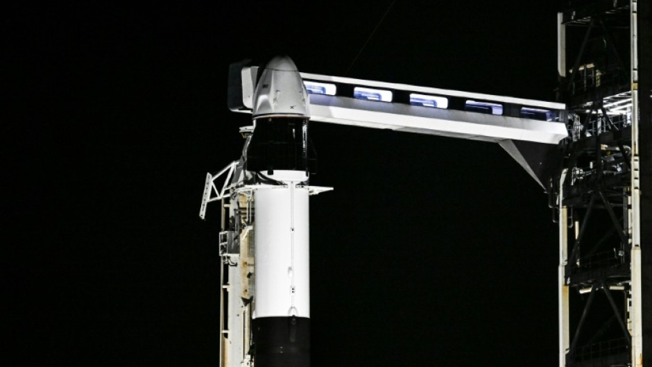 A SpaceX Falcon 9 rocket with the Crew Dragon Resilience capsule sits on Launch Complex 39A at Kennedy Space Center ahead of the Polaris Dawn Mission in Cape Canaveral, Florida, on August 28, 2024