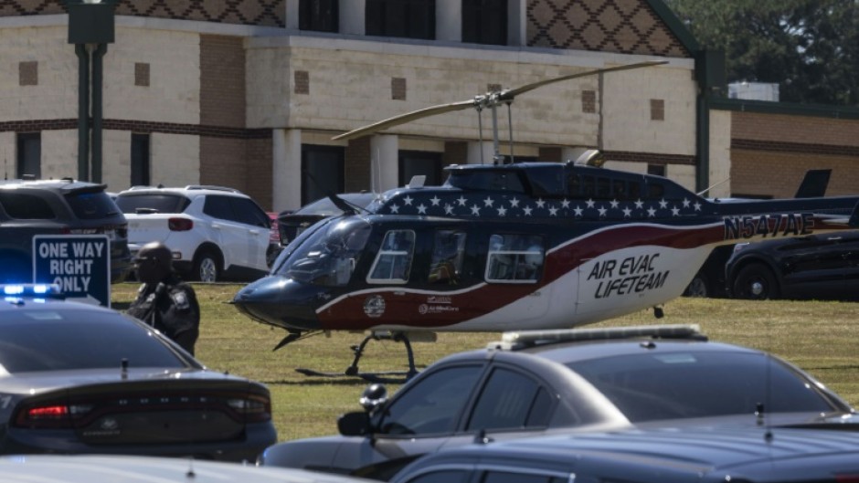 An air evacuation helicopter landed near the site of the shooting after the incident 