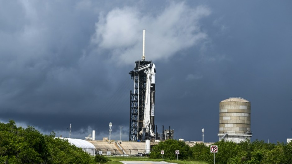 A SpaceX Falcon 9 rocket with the Crew Dragon Resilience capsule sits on Launch Complex 39A at Kennedy Space Center ahead of the Polaris Dawn Mission in Cape Canaveral, Florida