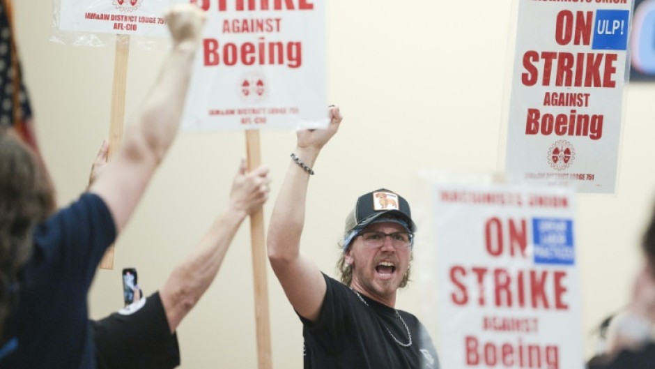 Boeing workers in the Seattle region overwhelmingly voted to strike and reject a contract 