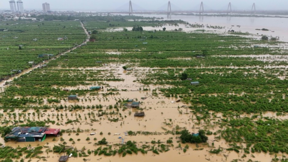 Floodwaters caused by Typhoon Yagi have destroyed crops across north Vietnam