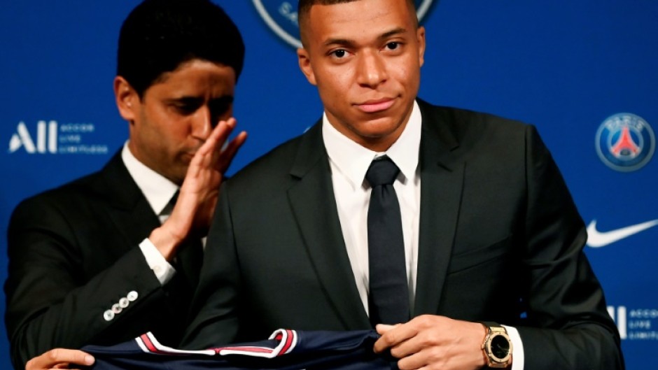 Paris Saint-Germain's CEO Nasser Al-Khelaifi and French forward Kylian Mbappe in happier times