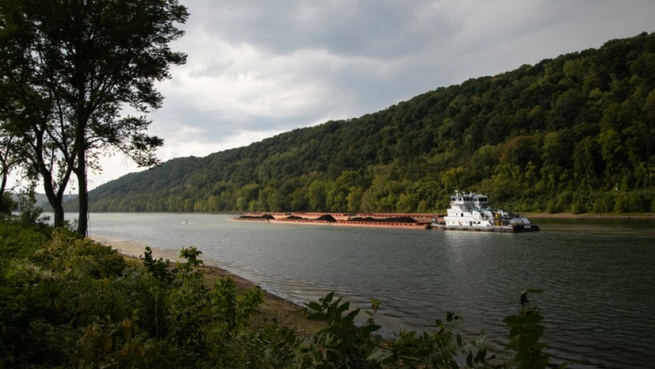 A coal barge is seen along the Monongahela River in Monongahela, Washington County