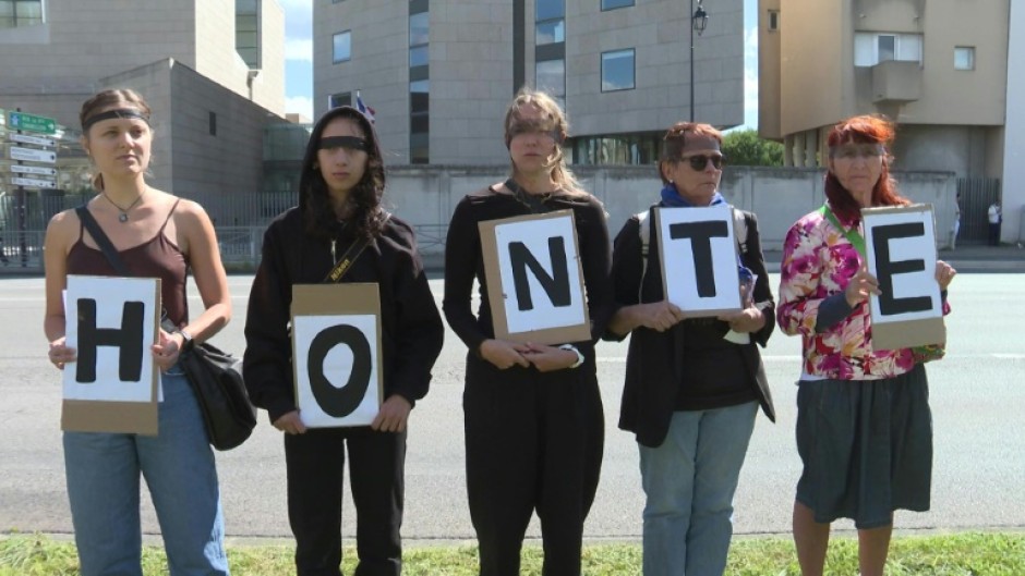 Hundreds rally in France in support of mass rape victim