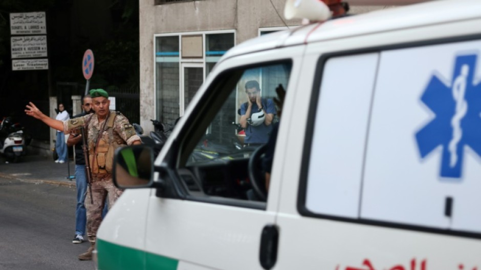 An ambulance rushes people to hospital in Beirut, after paging device explosions