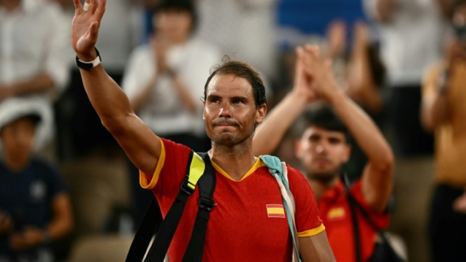 Rafael Nadal (L) and teammate Carlos Alcaraz after their elimination in the doubles at the Paris 2024 Olympics