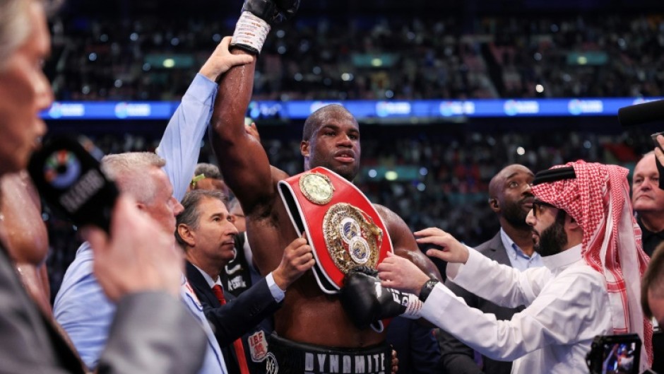 Britain's Daniel Dubois celebrates after defeating compatriot Anthony Joshua at Wembley to retain his IBF world heavyweight title