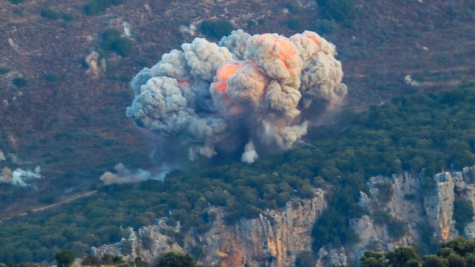 A plume of flame and smoke from an Israeli air strike on the Marjayoun area in south Lebanon near the border