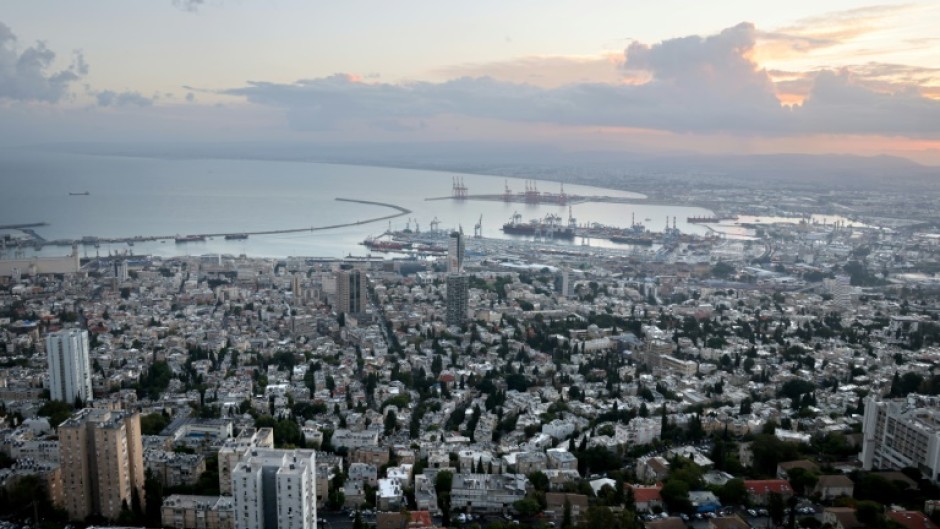 Streets in the Israeli port city of Haifa were largely deserted after Hezbollah rockets hit the city outskirts