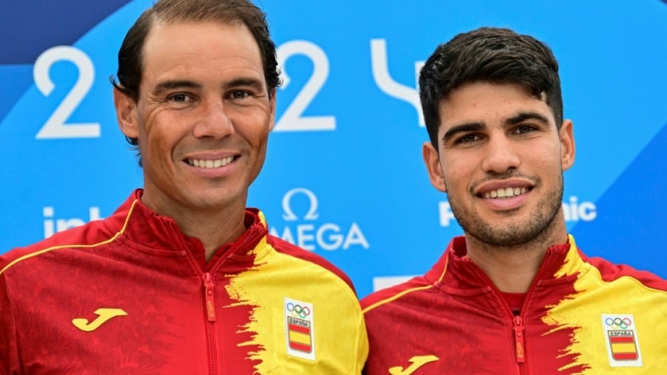 Spain's Rafael Nadal (L) and Carlos Alcaraz were named in the Davis Cup finals' team lists