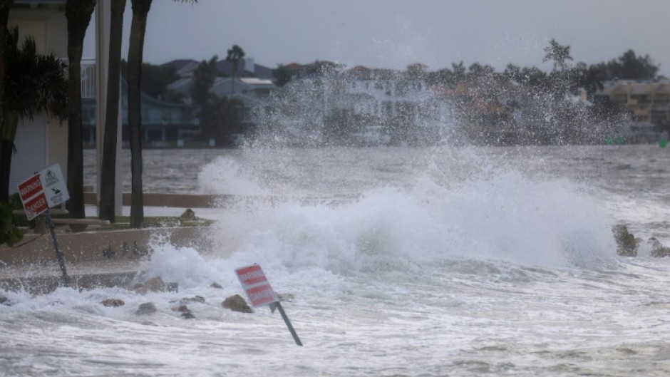 Waves crash onto St Pete Beach, Florida as Hurricane Helene churns offshore on September 26, 2024