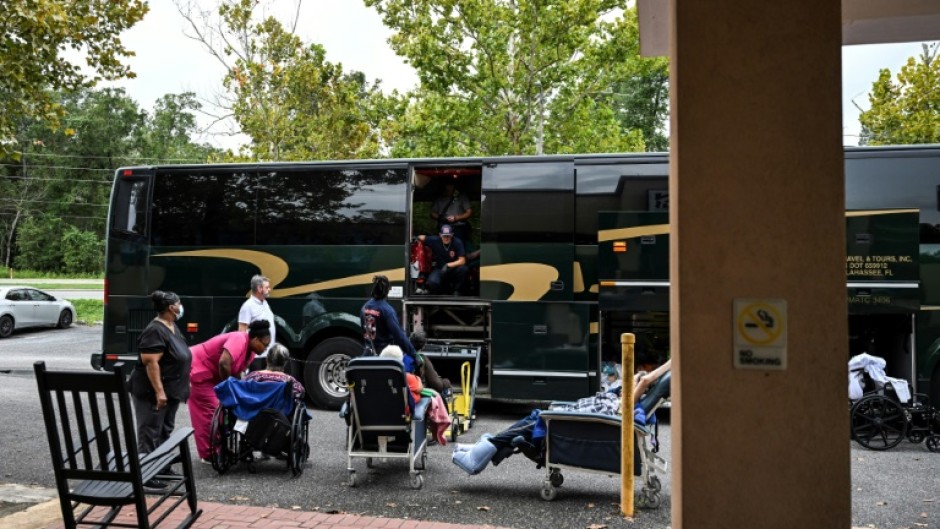 Residents of an nursing and rehabilitation facility in Crawfordville, Florida are evacuated ahead of the arrival of Hurricane Helene