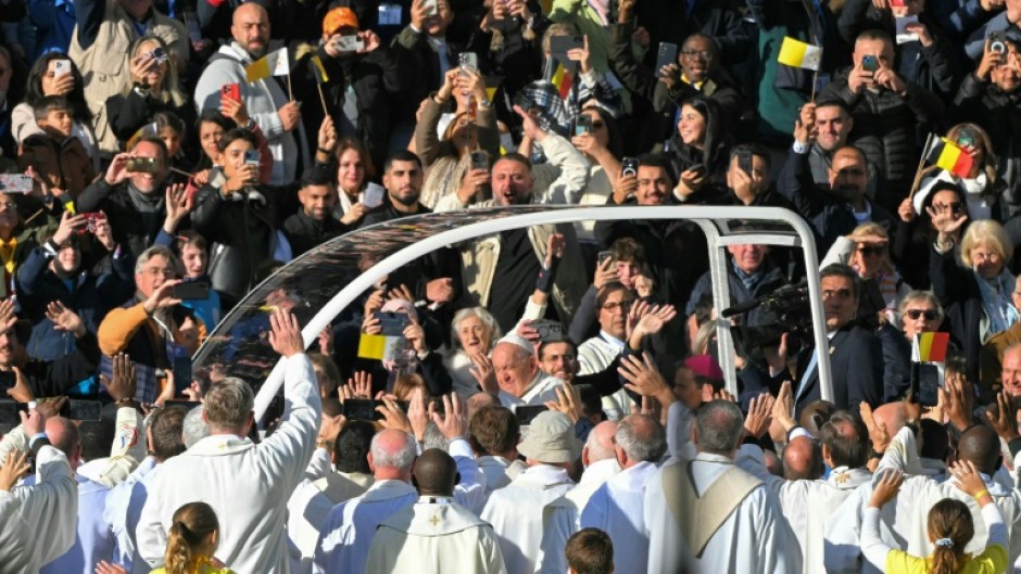 The Argentine pontiff, 87, arrived at the stadium in Brussels in bright morning sunshine