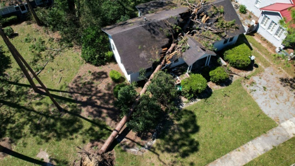 The storm left a swath of damage across at least five US states, including Georgia