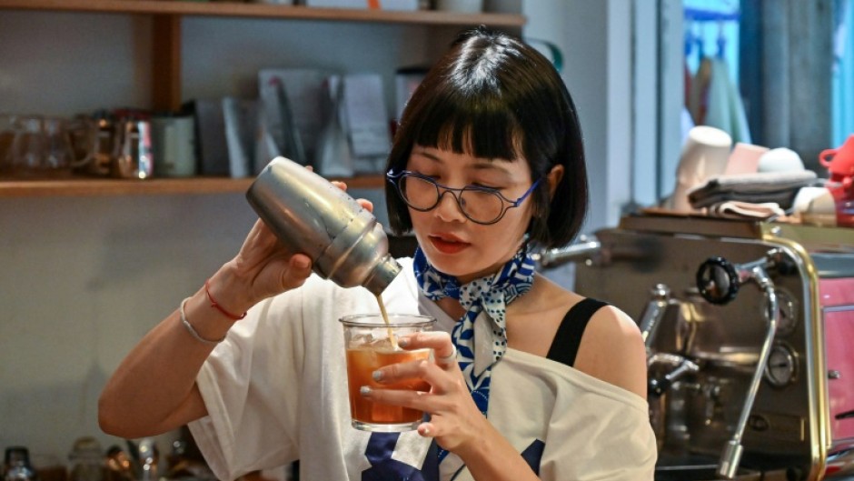 A former journalist, Nguyen Thi Hue now thrives in Hanoi's dynamic coffee industry