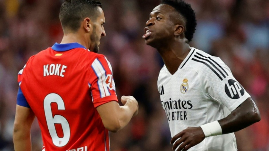 Real Madrid forward Vinicius Junior (R) is hoping to win the Ballon d'Or at the end of October