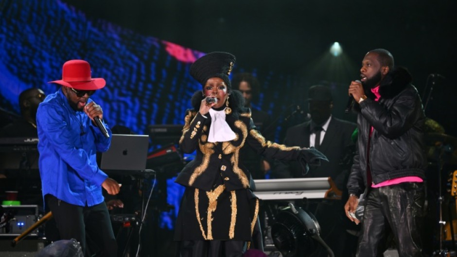 Wyclef Jean (L), Lauryn Hill (C) and Pras Michel (R) of The Fugees perform at the Global Citizen festival, September 2023