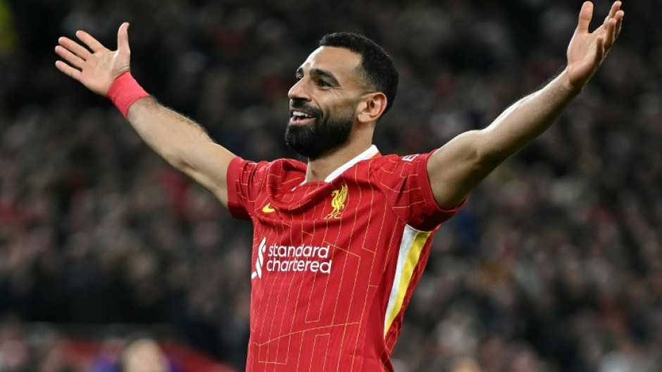 Liverpool's Mohamed Salah celebrates scoring against Bologna