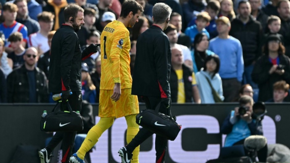 Liverpool goalkeeper Alisson Becker limped off late on