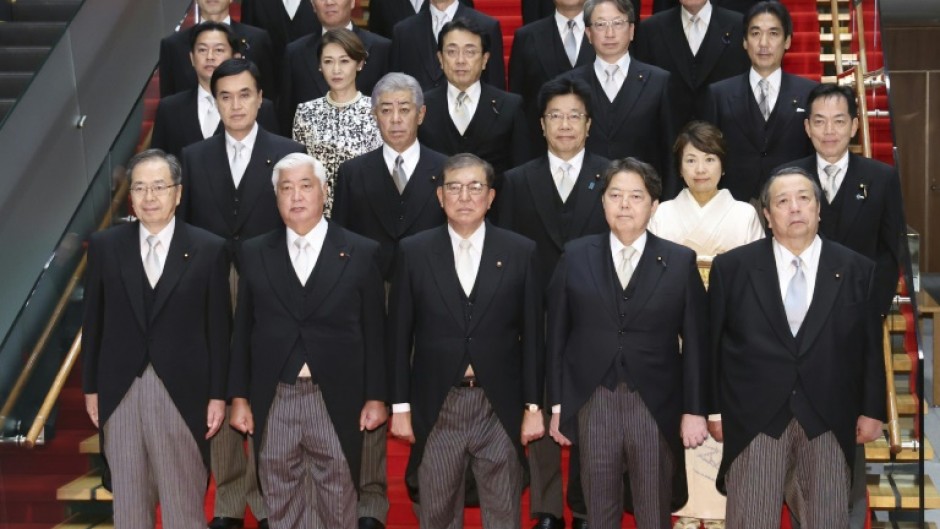 Images taken by local media showed what appeared to be an untidy patch of white shirt under the morning suits of Prime Minister Shigeru Ishiba and Defence Minister Gen Nakatani