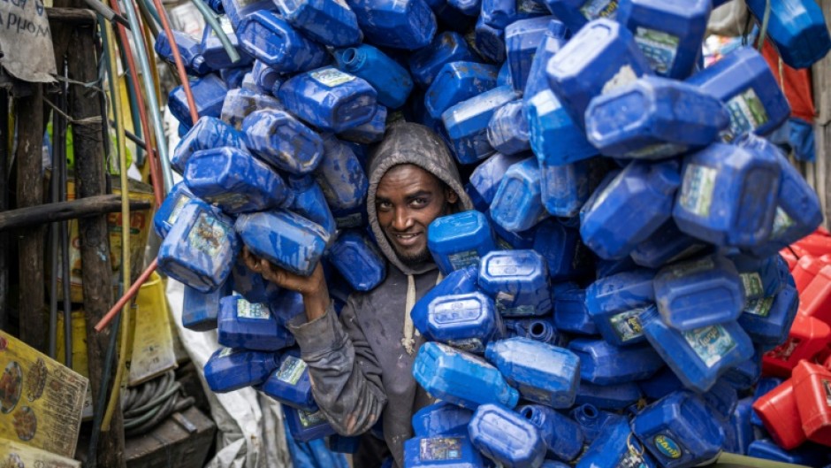 Ezedin Muste, 23, is one of thousands of waste collectors known in Amharic as 'korale' 