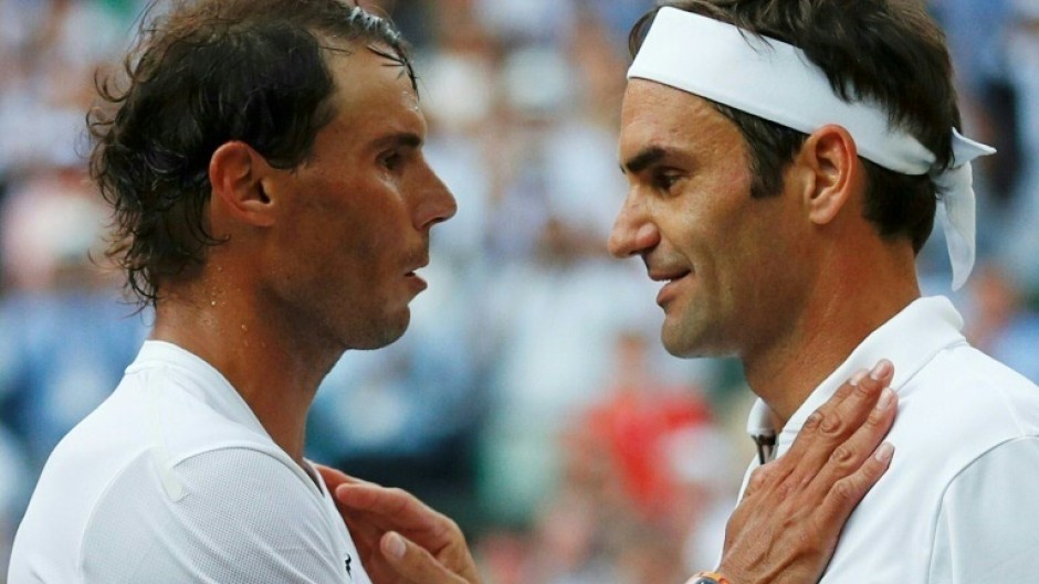 'Unforgettable memories' - Roger Federer (R) and Rafael Nadal (L) after the Swiss legend won their semi-final match at Wimbledon in July 2019