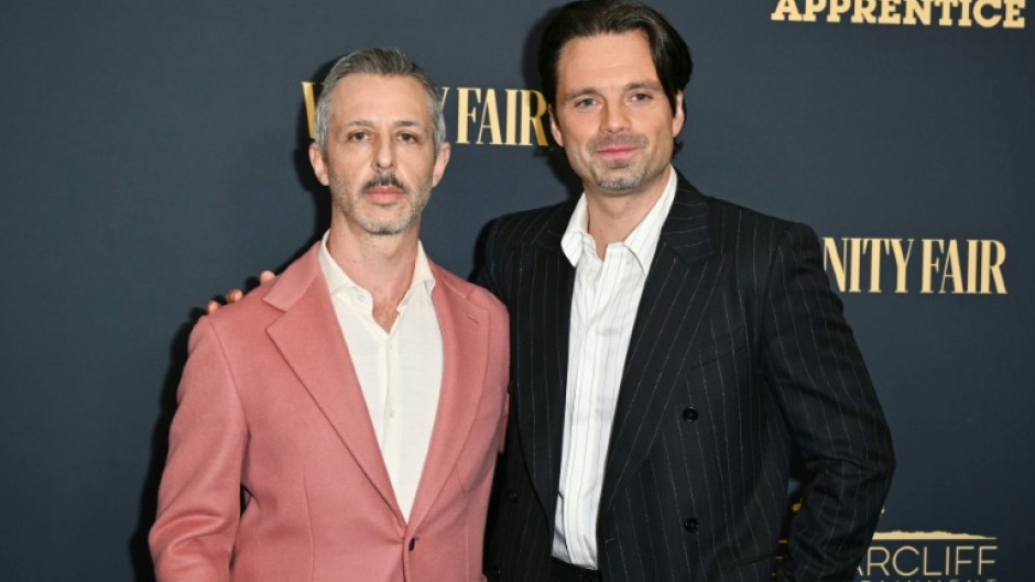 Jeremy Strong (L) and Sebastian Stan star in 'The Apprentice' an explosive biopic of Donald Trump that hits theatres in the final weeks of his 2024 US presidential race against Kamala Harris