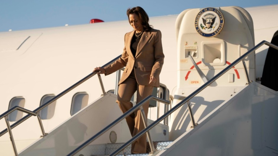 US Vice President and Democratic presidential candidate Kamala Harris steps off Air Force Two as she arrives in Phoenix, Arizona