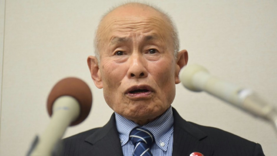 A grassroots group of survivors formed after the 1945 atomic bombings in Japan reacted with tears and dire warnings on Friday after winning the Nobel Peace Prize