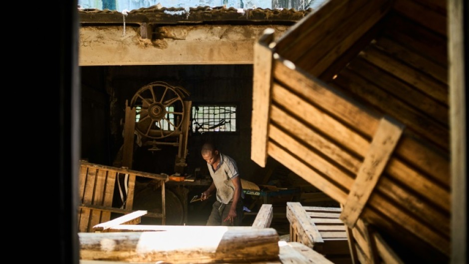 The coffin workshop in downtown Beira has a disused sawmill