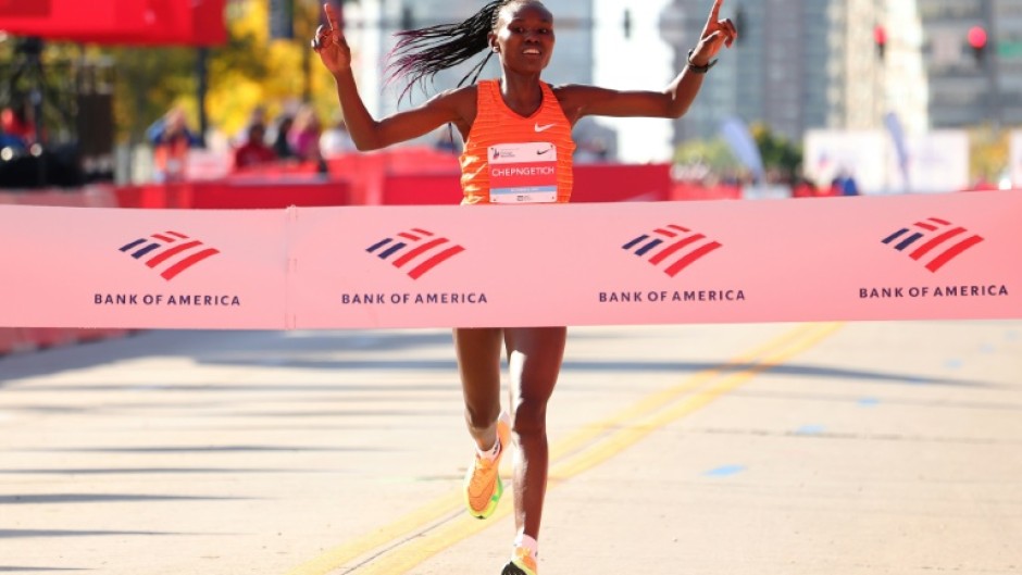 Ruth Chepngetich set a women's world record as she won the Chicago Marathon for a third time